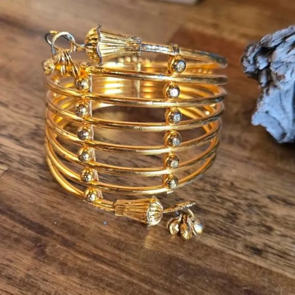 Gold Tone Multi Band Rhinestone Bangle Bracelet Floral Charm 2.5